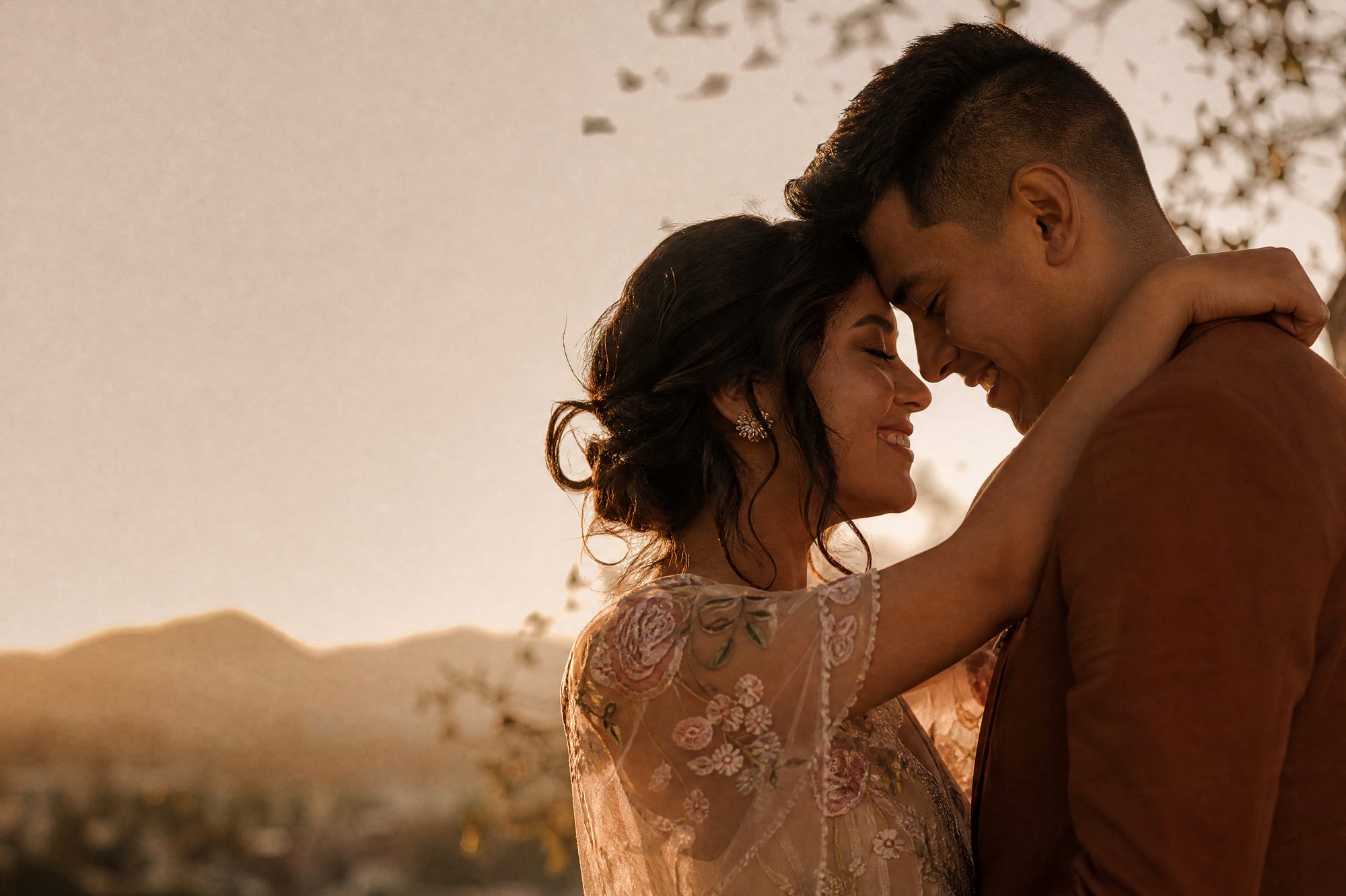A Latino couple together on their wedding day